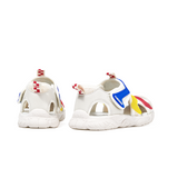 TARANIS Stage 3  Red, yellow, and blue cut-out cap-toe sandals